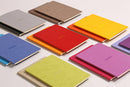 Rhodia Sewn Spine Dot Grid Notebook - A5: TANGERINE